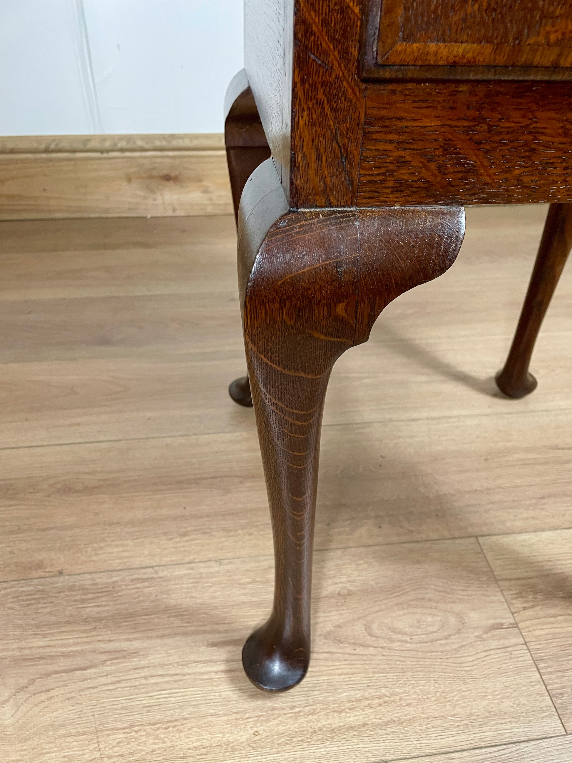 Wooden furniture leg on a wooden floor