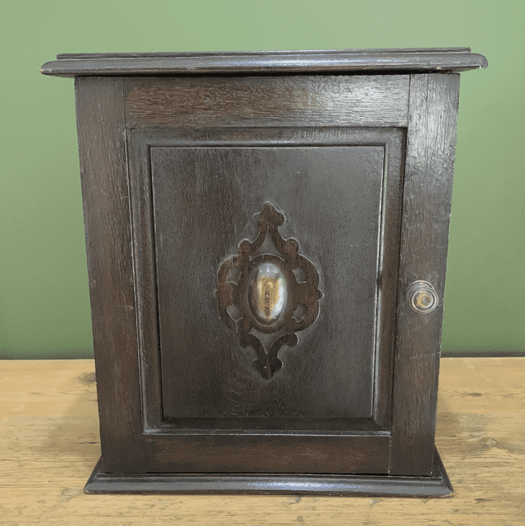 Embrace the Vintage Splendor with the Edwardian Oak Smokers Cabinet