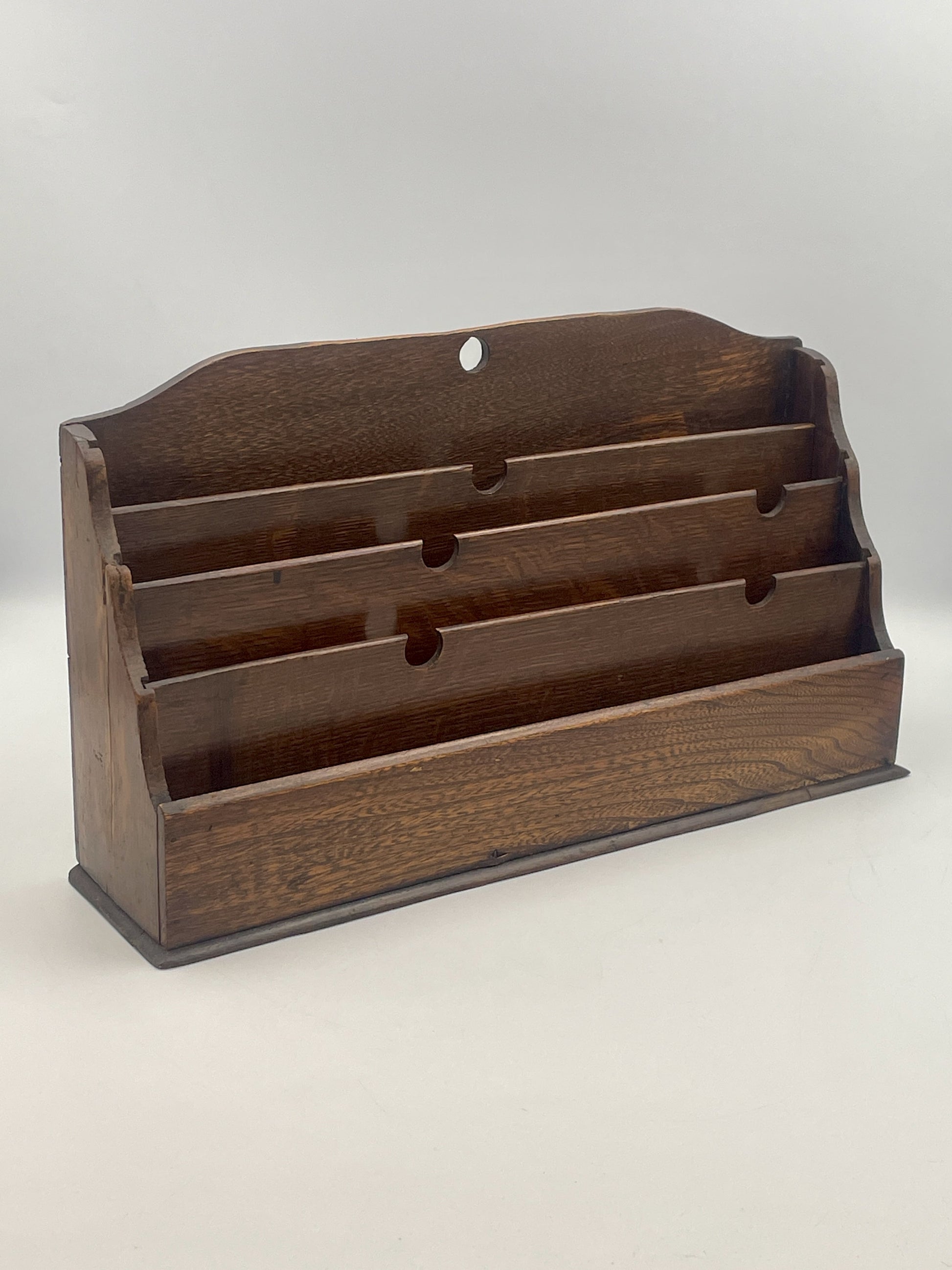Wooden letter holder on a white background