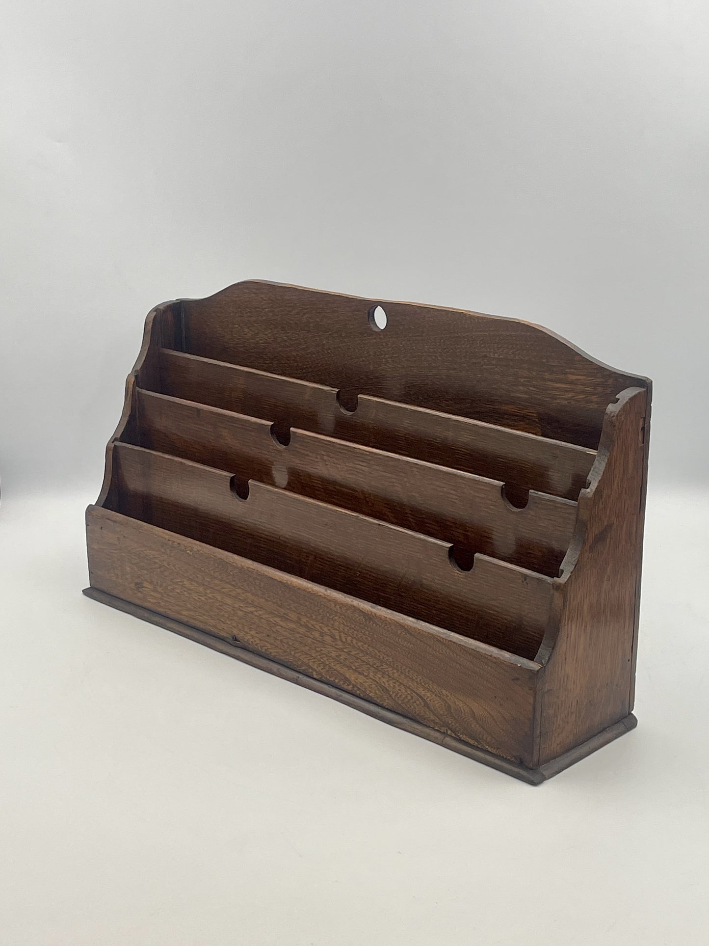 Wooden letter holder on a white background