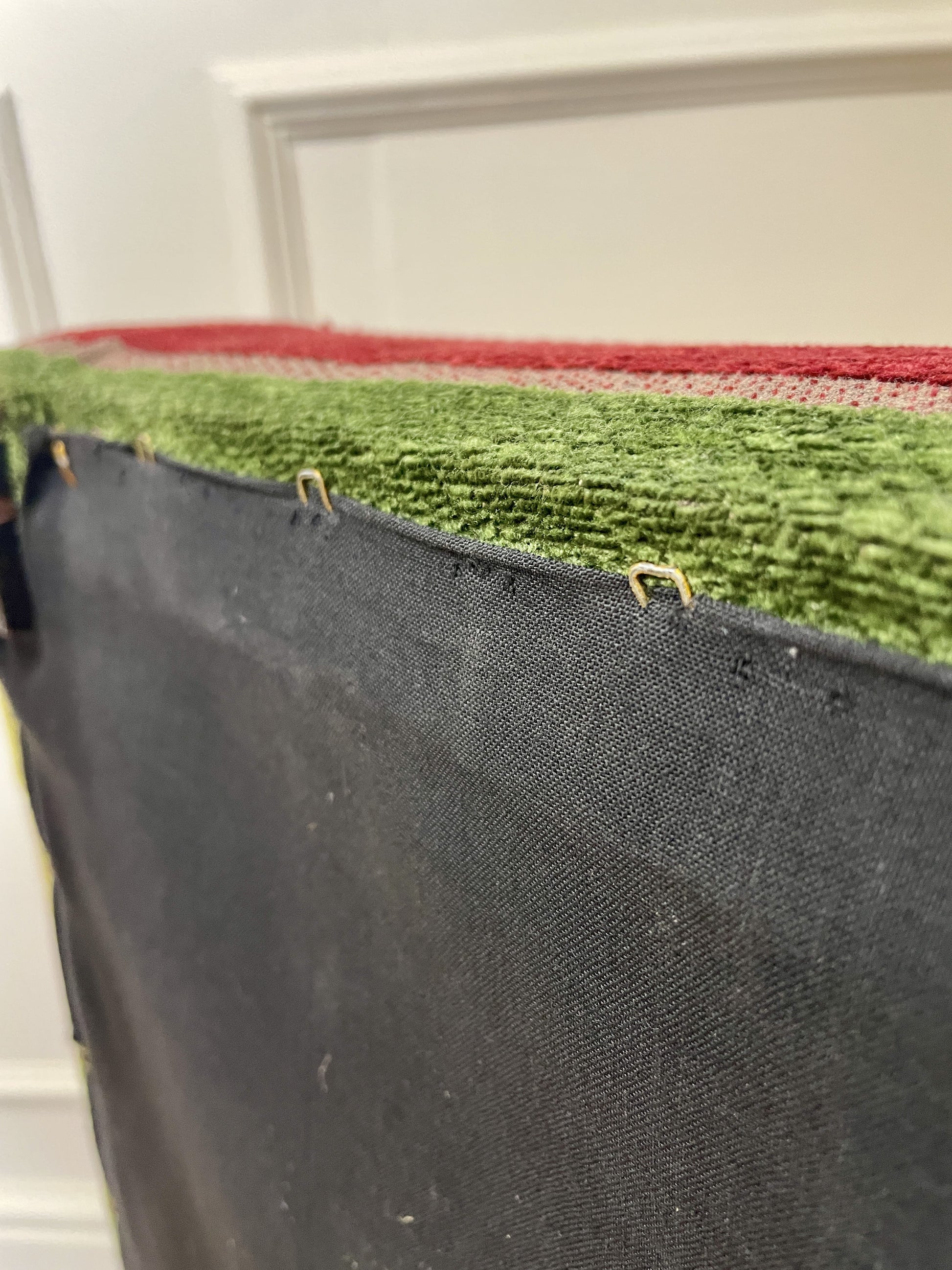 Vintage solid oak long low footstool with multicoloured upholstery and turned legs. Restored, sturdy and full of charm – a perfect accent for any living space.