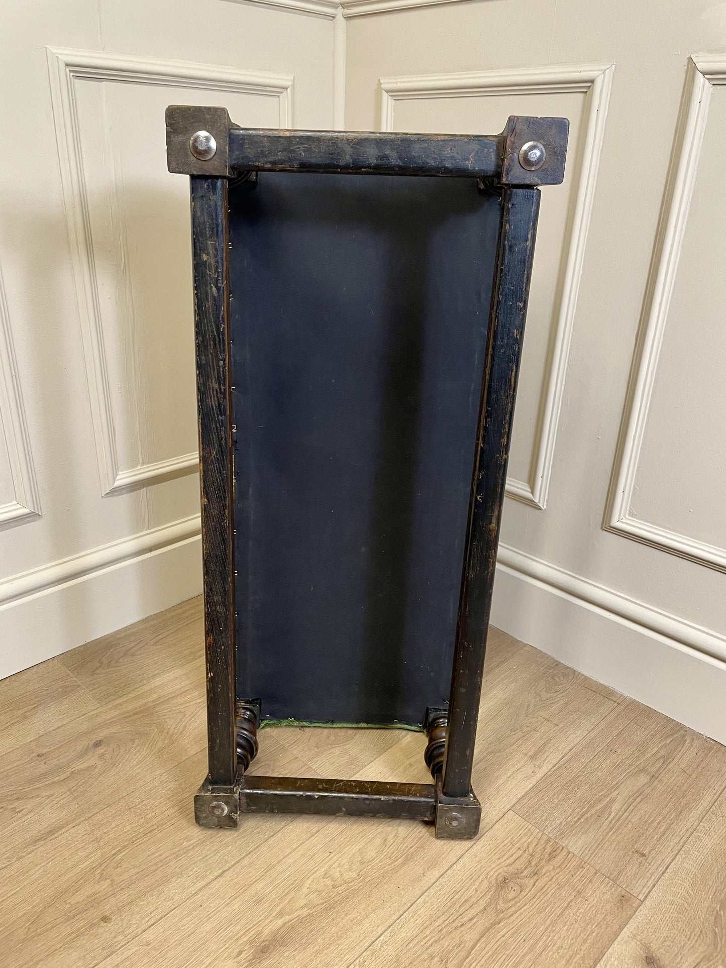 Vintage solid oak long low footstool with multicoloured upholstery and turned legs. Restored, sturdy and full of charm – a perfect accent for any living space.