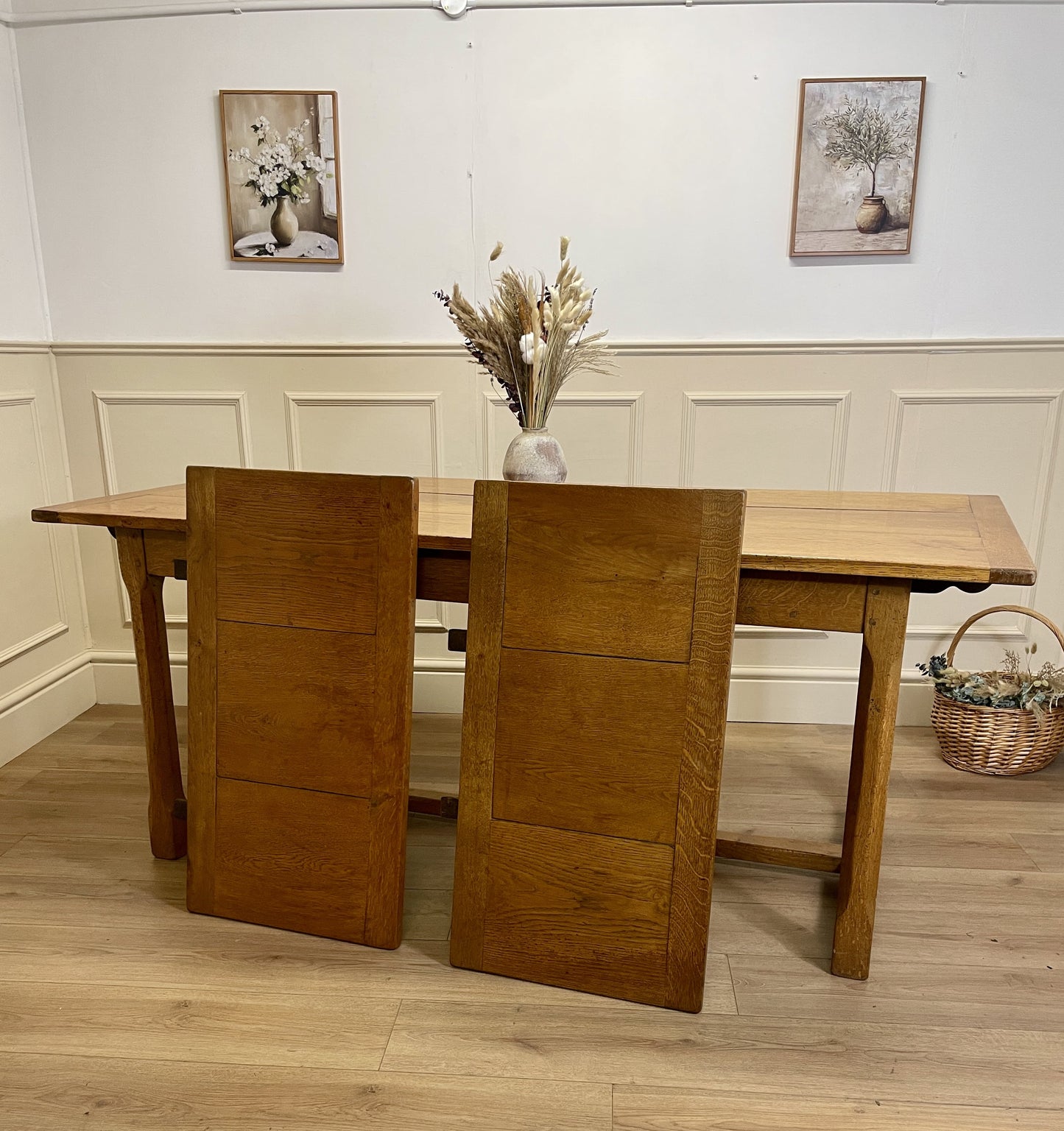 Light oak extendable dining table on square chamfered legs