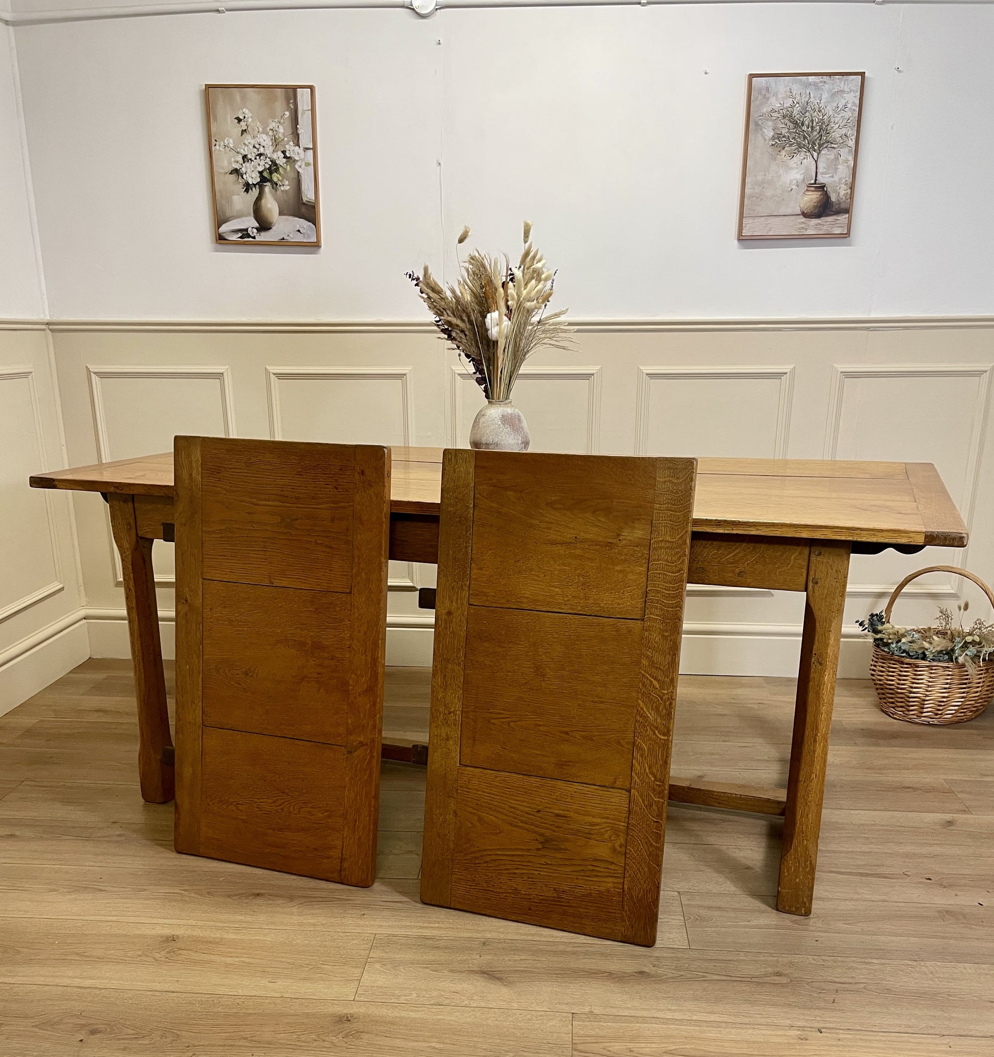 Light oak extendable dining table on square chamfered legs