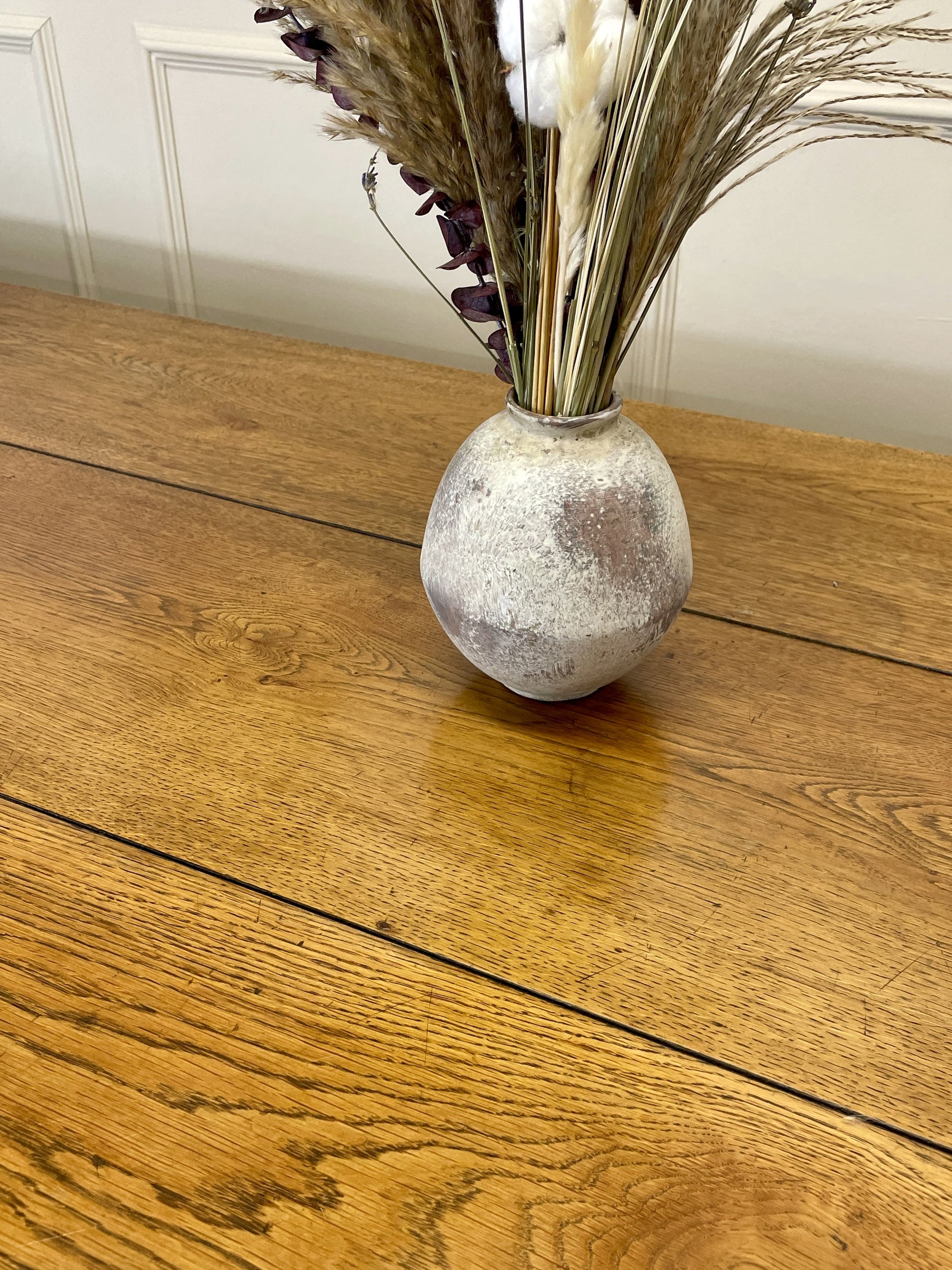 Light oak extendable dining table on square chamfered legs