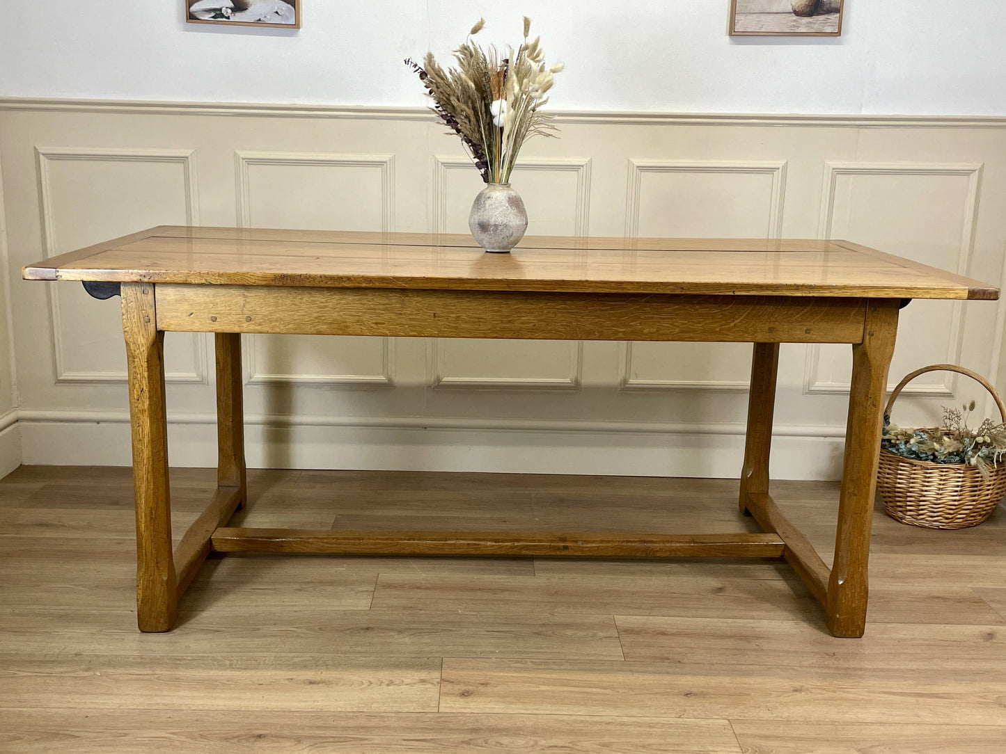 Light oak extendable dining table on square chamfered legs