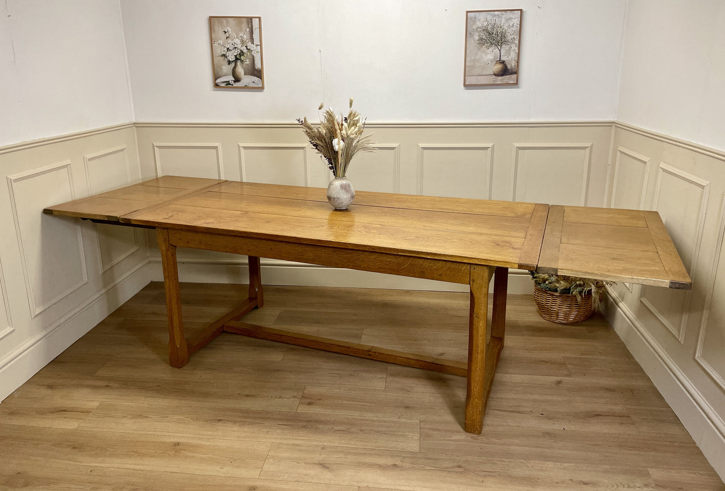 Light oak extendable dining table on square chamfered legs