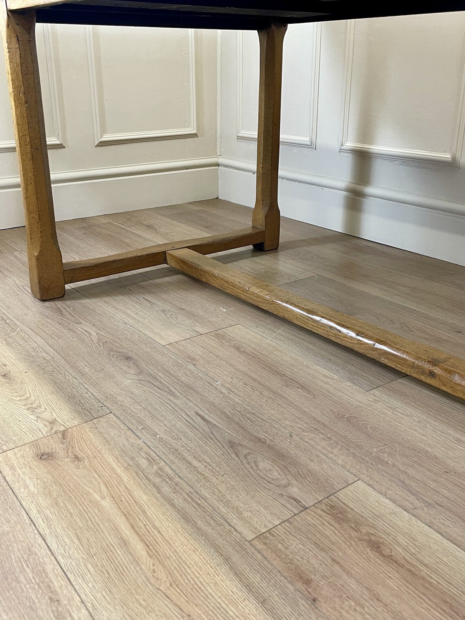 Light oak extendable dining table on square chamfered legs