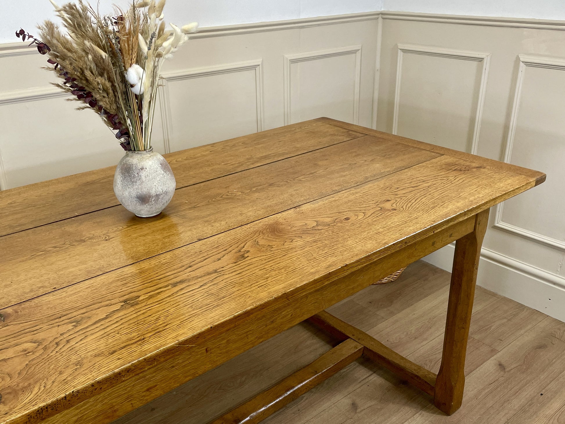 Vintage solid oak extending dining table with draw leaf design