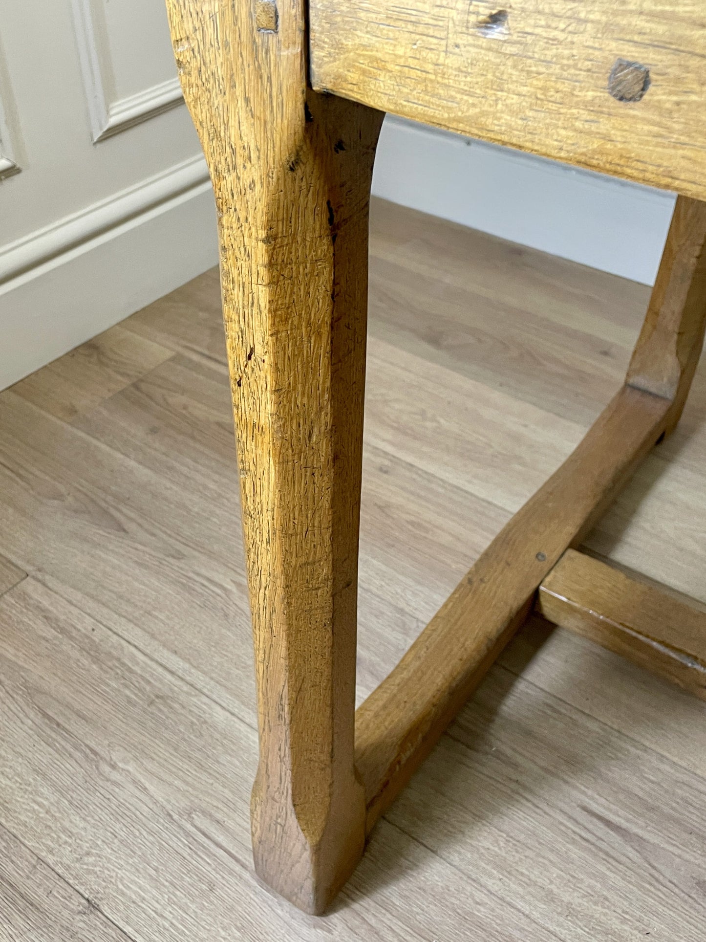 Light oak extendable dining table on square chamfered legs