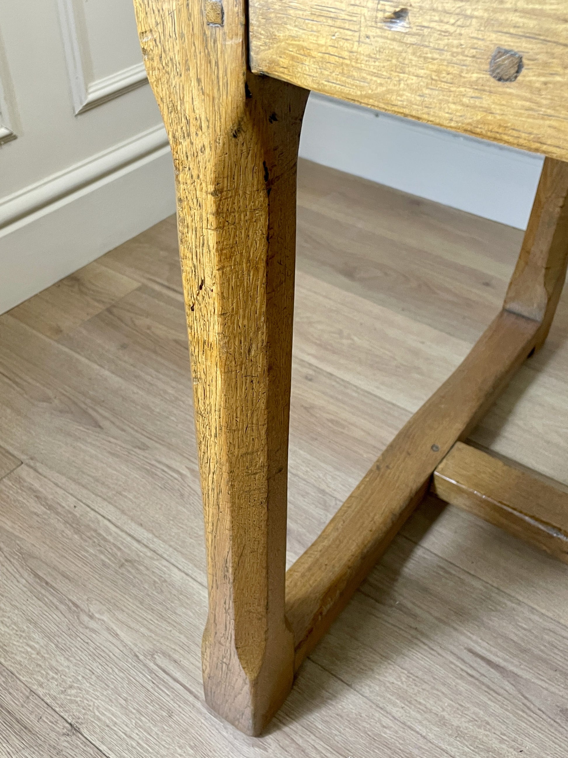 Light oak extendable dining table on square chamfered legs