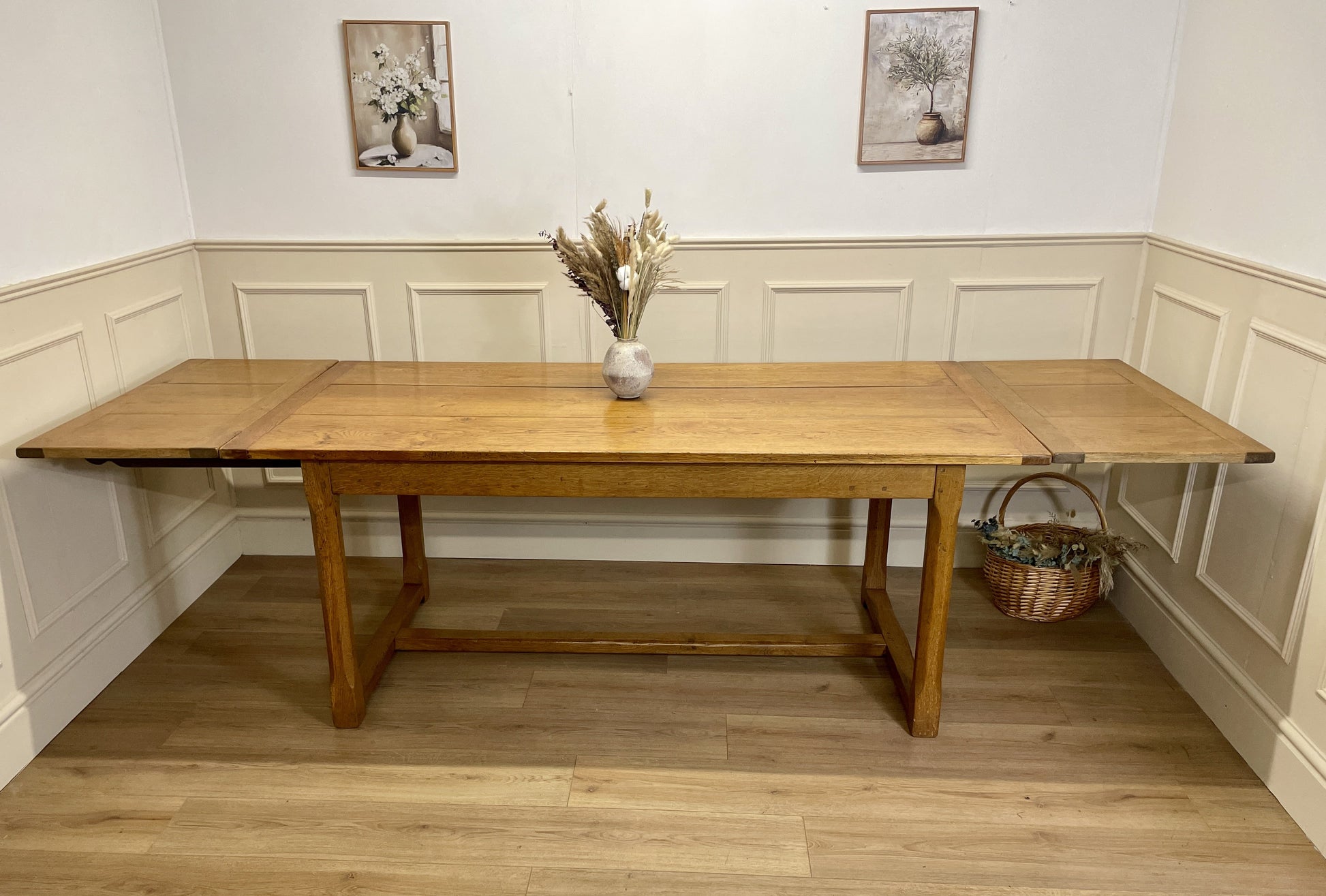 Vintage solid oak extending dining table with draw leaf design