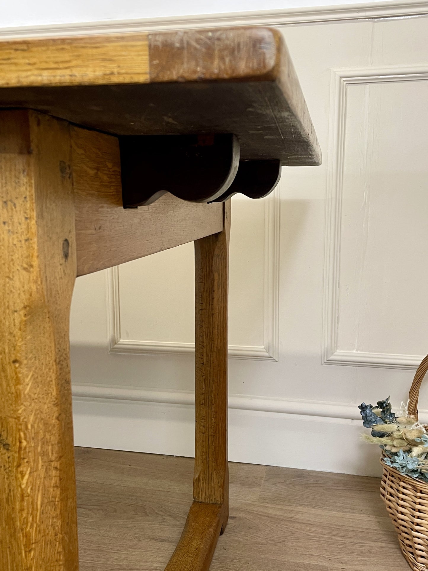 Light oak extendable dining table on square chamfered legs