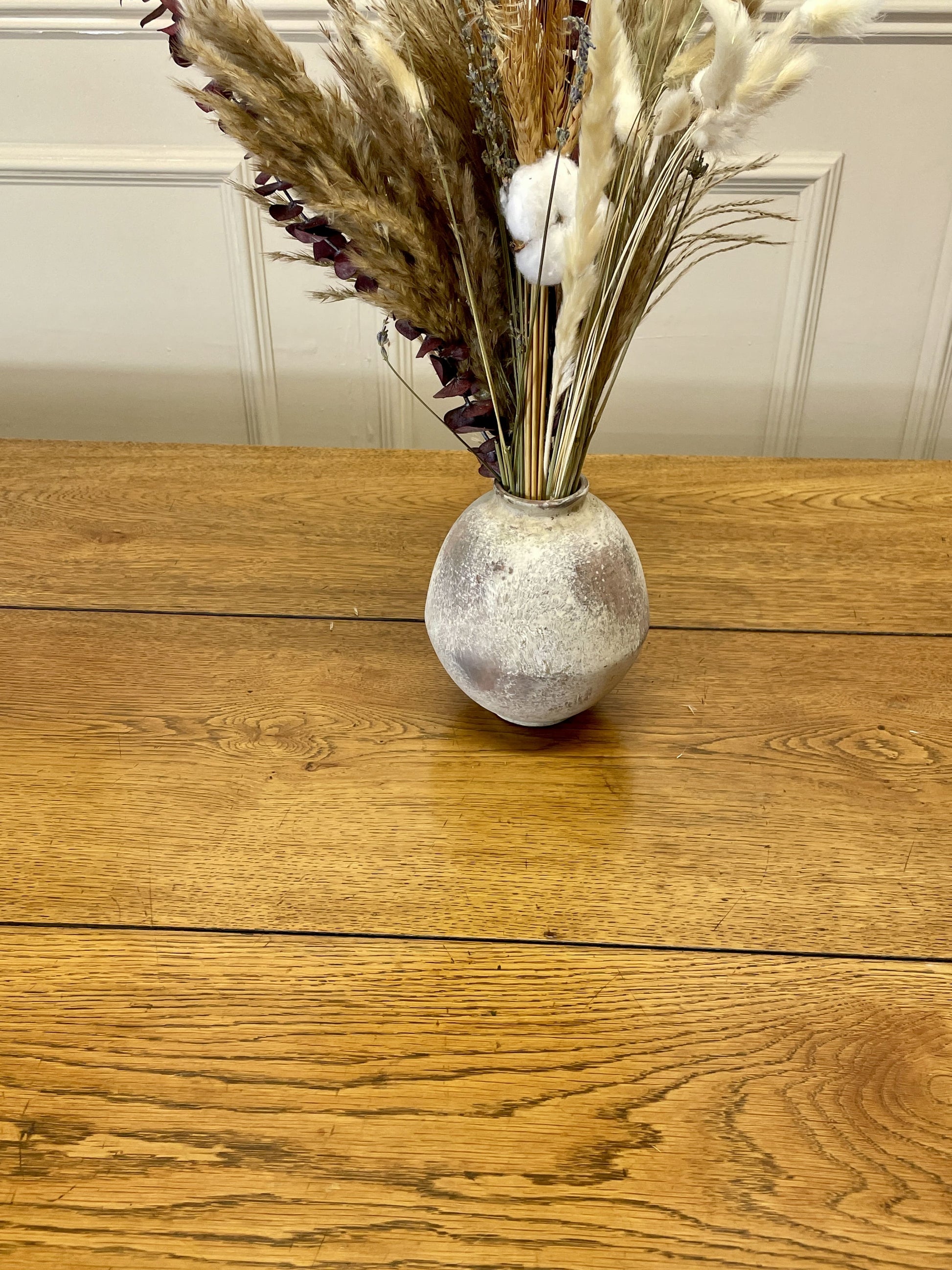 Light oak extendable dining table on square chamfered legs