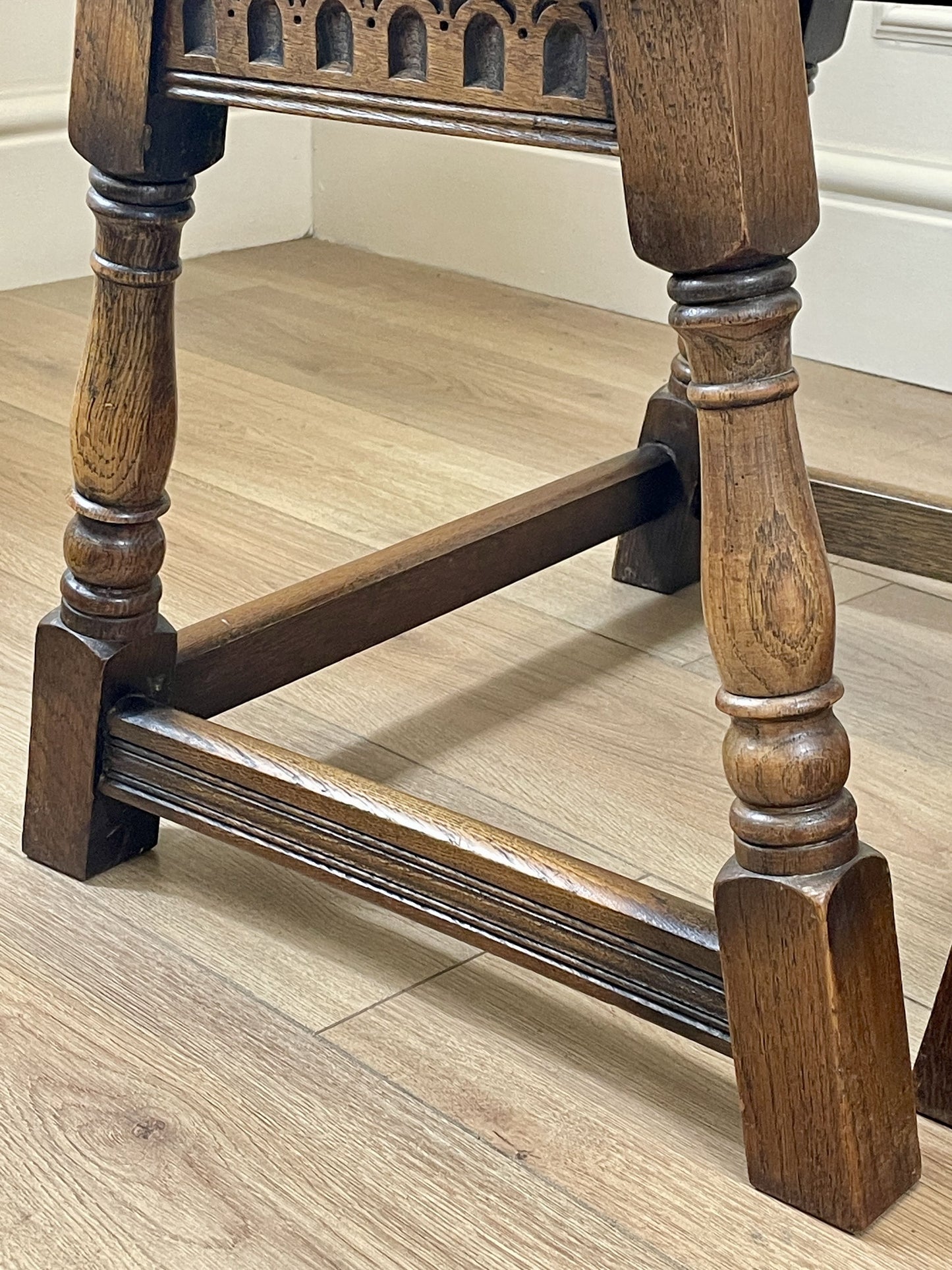 Vintage solid oak nest of 3 small tables with carved detail and splayed legs. Restored and ideal as practical antique side tables in any living room.