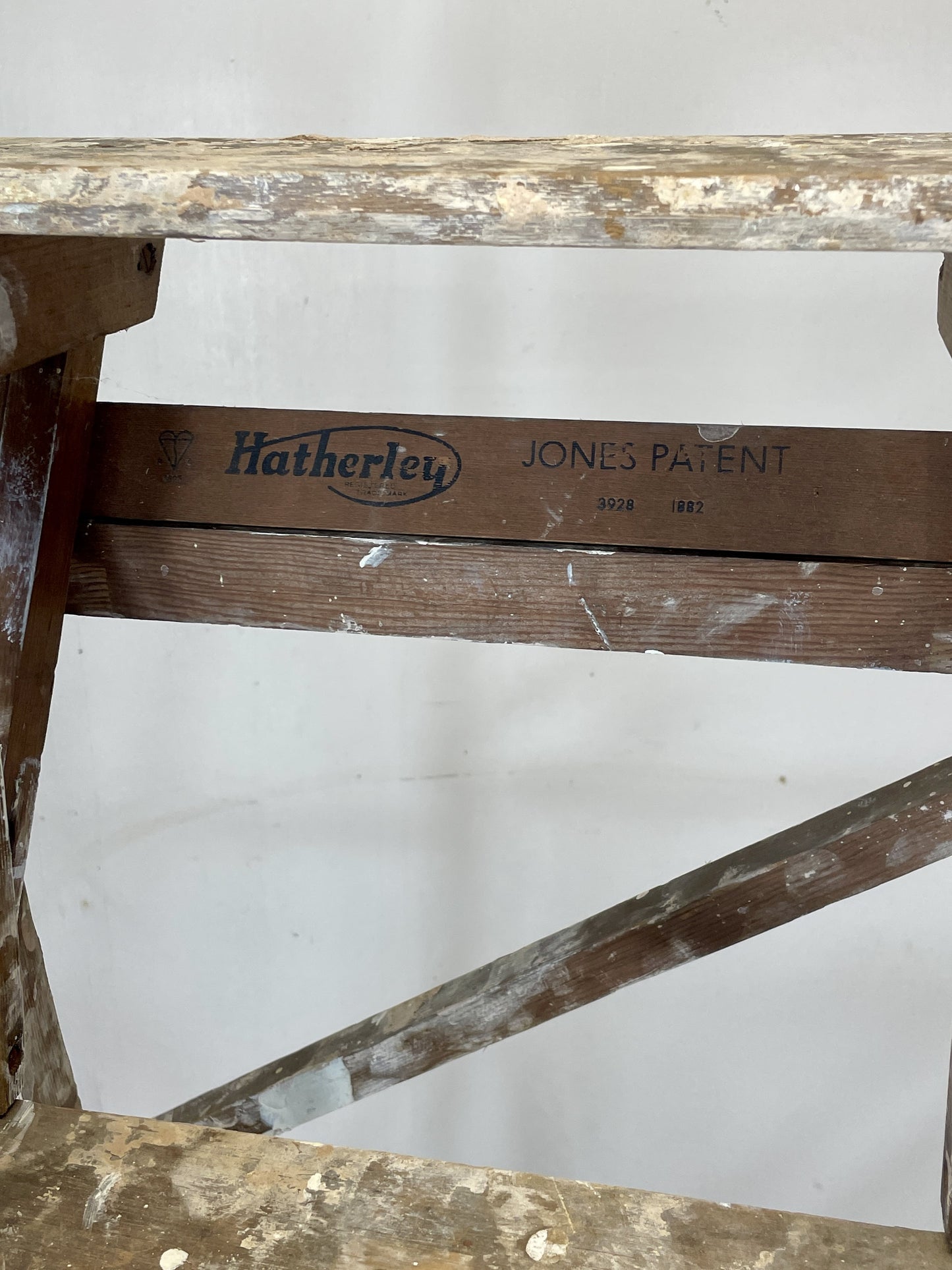 Wooden structure with 'Hatherley Jones Patent' branding on a white background